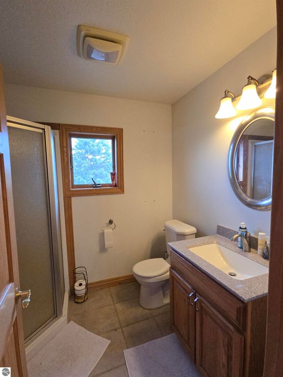 Image 26 of property listing at 10989 E Pleasant Valley Road, Shepherd, MI 48883