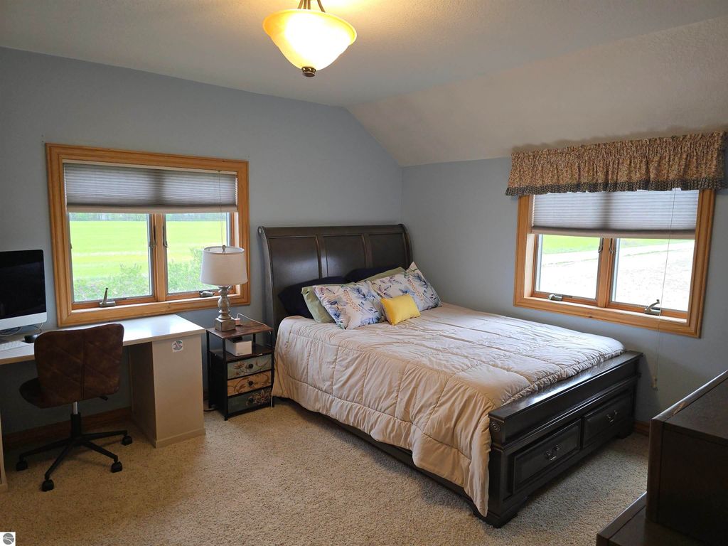 Image 27 of property listing at 10989 E Pleasant Valley Road, Shepherd, MI 48883