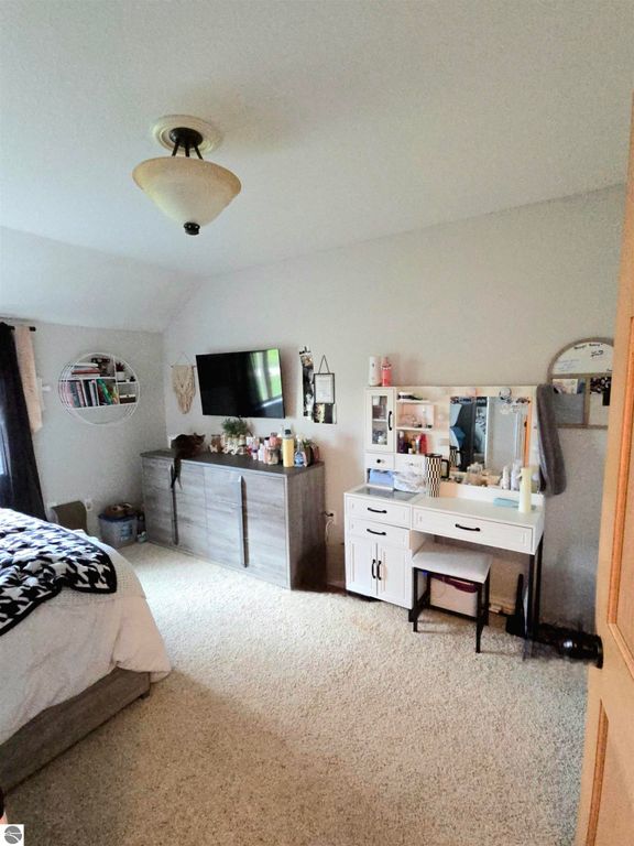 Image 30 of property listing at 10989 E Pleasant Valley Road, Shepherd, MI 48883