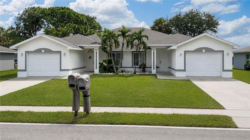 211/213 SE 24th AVE, CAPE CORAL, FL 33990 — exterior