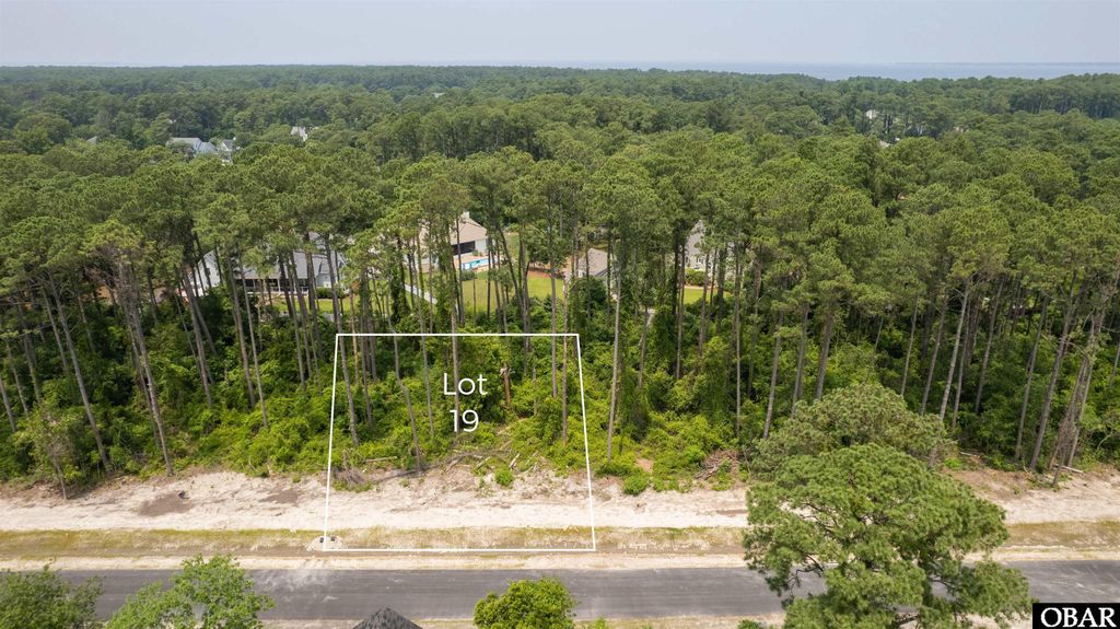 Image 1 of property listing at 0 Shady Pines Lane Lot 19, Manteo, NC 27954