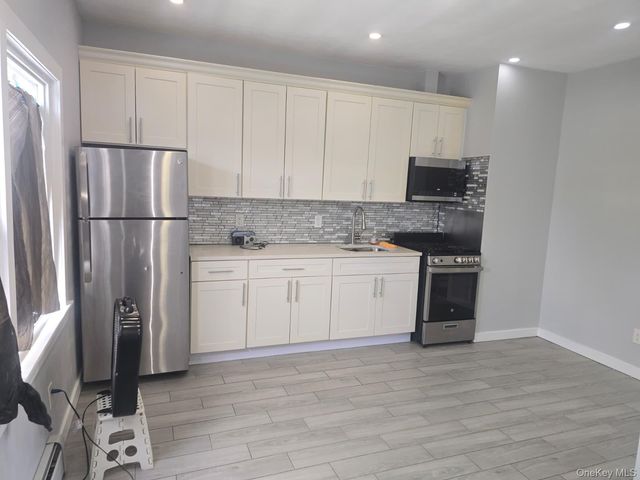 9007 Rockaway Boulevard 2nd Floor, Ozone Park, NY 11416