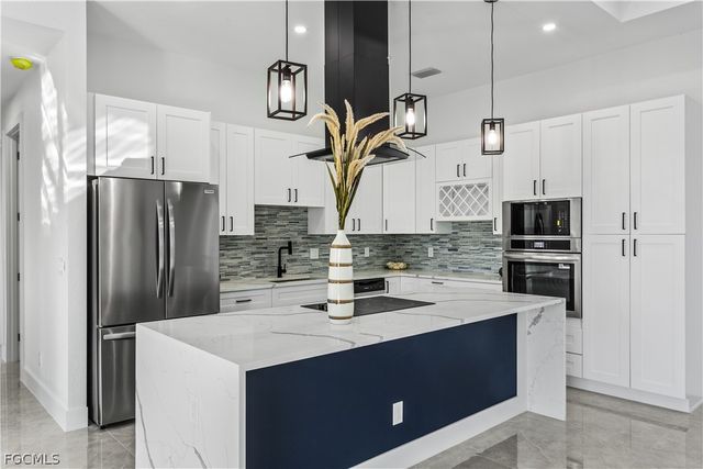 3318 NE 13th PL, Cape Coral, FL 33909