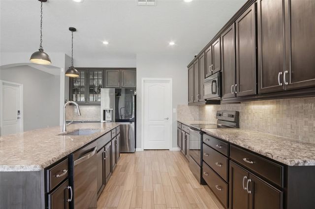 6818 GOLDFLOWER AVE, Harmony, FL 34773