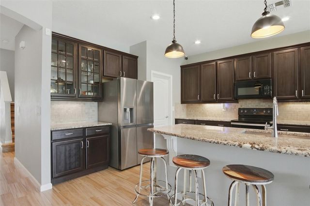 6818 GOLDFLOWER AVE, Harmony, FL 34773