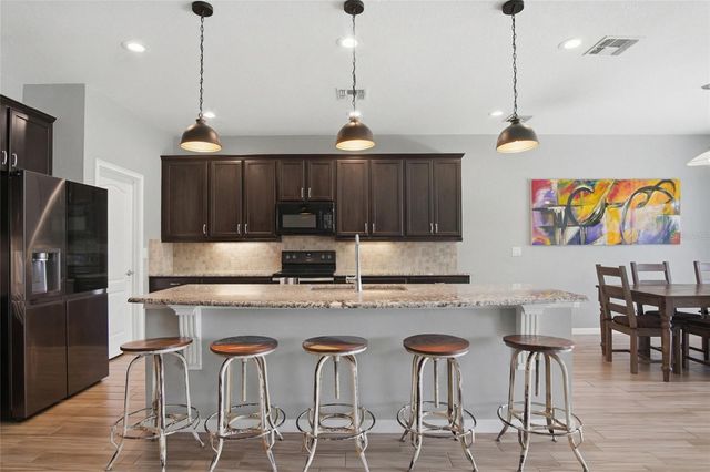 6818 GOLDFLOWER AVE, Harmony, FL 34773