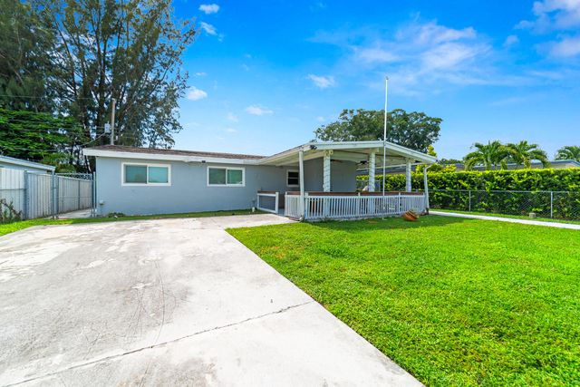 735 Hibiscus Drive, Royal Palm Beach, FL 33411