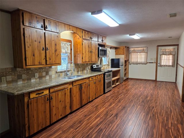 15318 Arrowhead Loop W, Willis, TX 77378