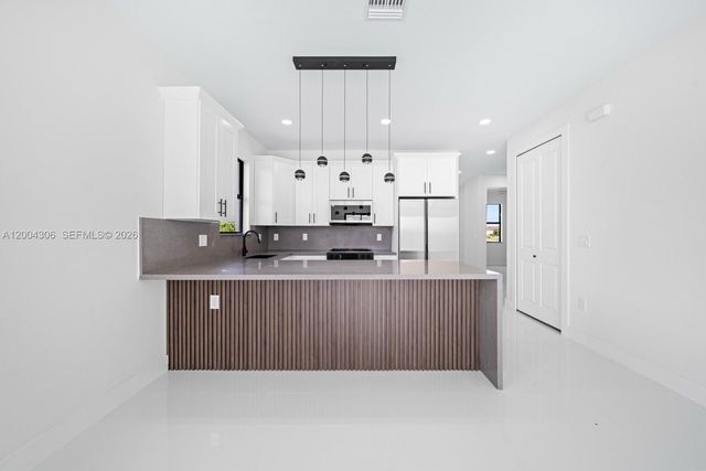 322 Ranch Ave, Lehigh Acres, FL 33974