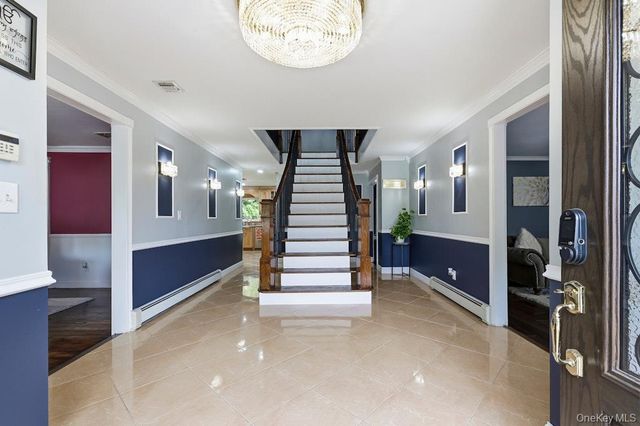 1 Whispering Court, Dix Hills, NY 11746