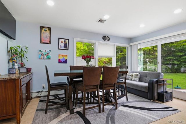1 Whispering Court, Dix Hills, NY 11746