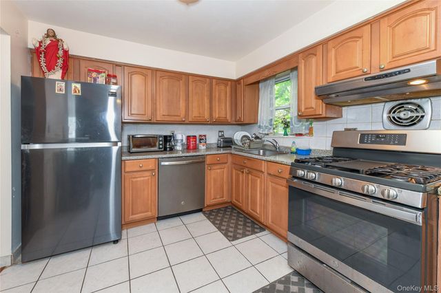 97-33 90th Street, Ozone Park, NY 11416