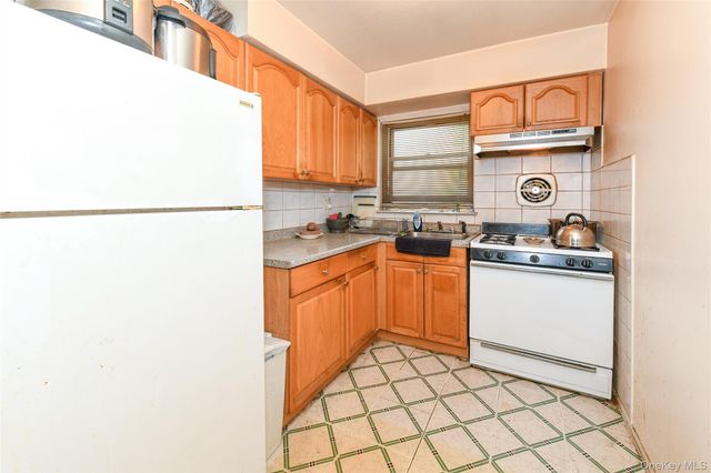 97-33 90th Street, Ozone Park, NY 11416
