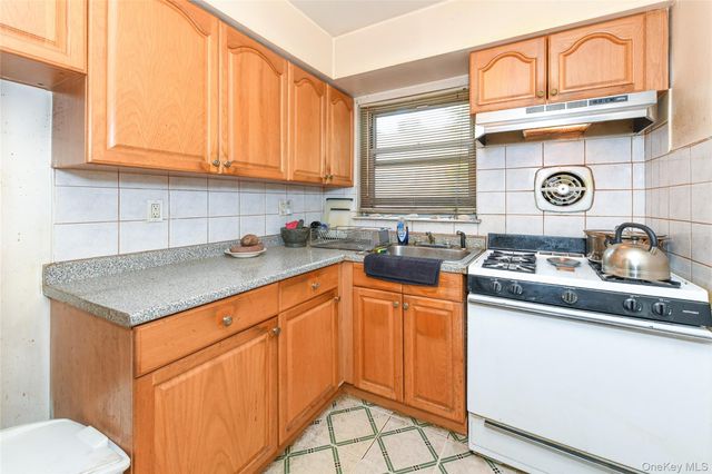 97-33 90th Street, Ozone Park, NY 11416