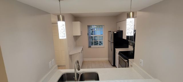 1125 Lake Shore Drive 202, Lake Park, FL 33403