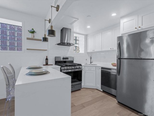 97-30 64th Avenue, Rego Park, NY 11374