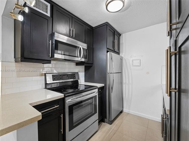 633 S Royal Poinciana Blvd A106, Miami Springs, FL 33166