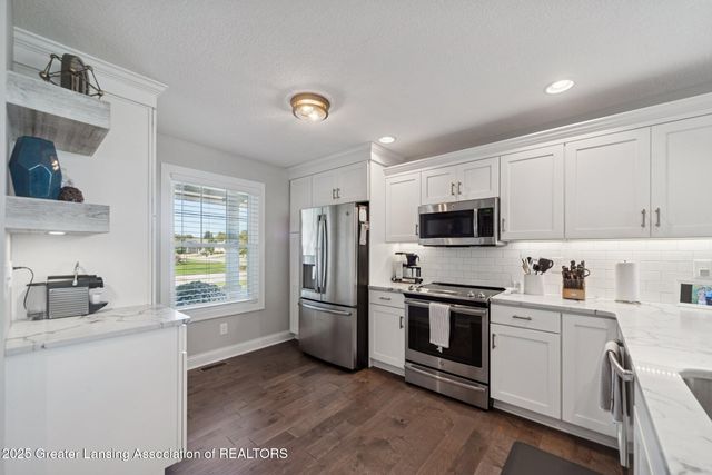 5342 E Hawk Hollow Drive, Bath, MI 48808