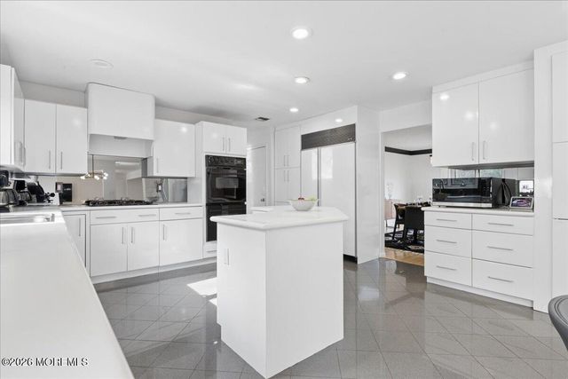 220 Tracy Drive, Morganville, NJ 07751