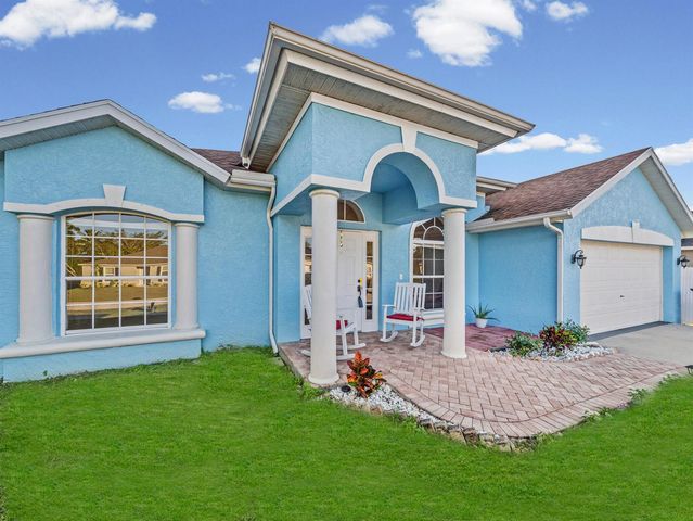982 SW Worcester Lane, Port St. Lucie, FL 34953