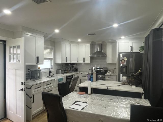 83 Woodbine Drive, Hicksville, NY 11801