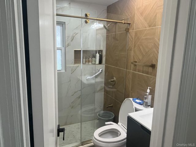 83 Woodbine Drive, Hicksville, NY 11801
