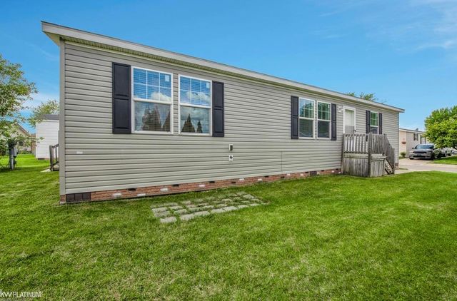 17128 Scarborough Drive, Macomb, MI 48044