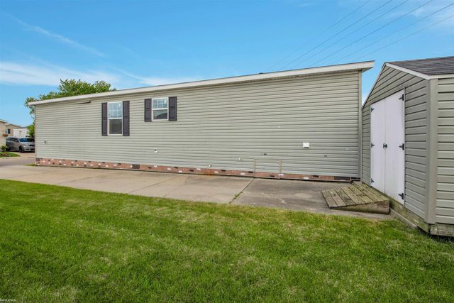17128 Scarborough Drive, Macomb, MI 48044