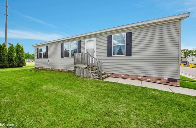 17128 Scarborough Drive, Macomb, MI 48044