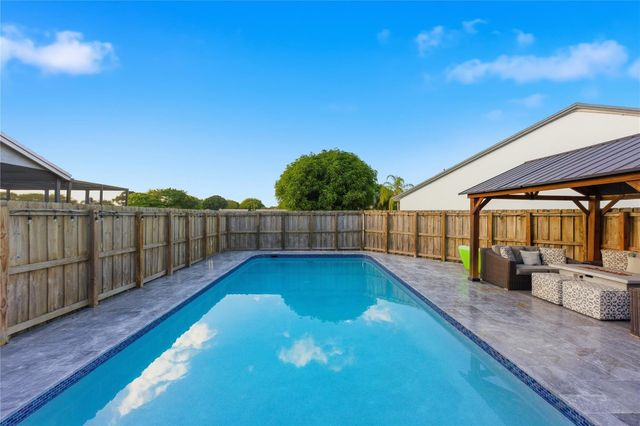 23367 Boca Trace Drive, Boca Raton, FL 33433