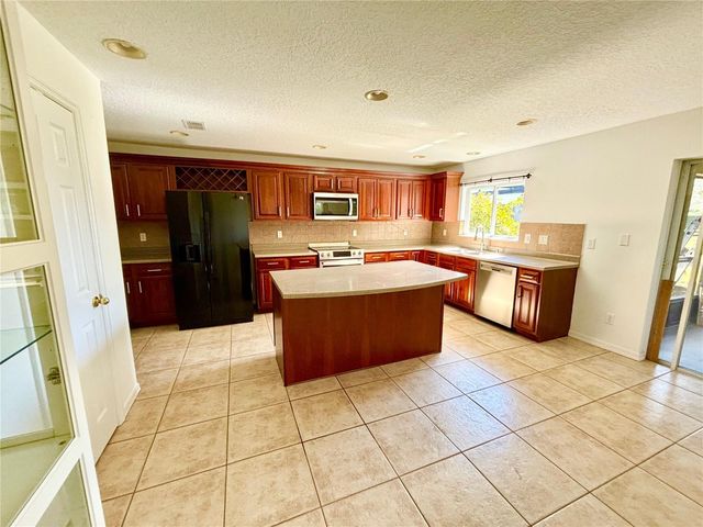 10812 TILSTON POINT, Orlando, FL 32832