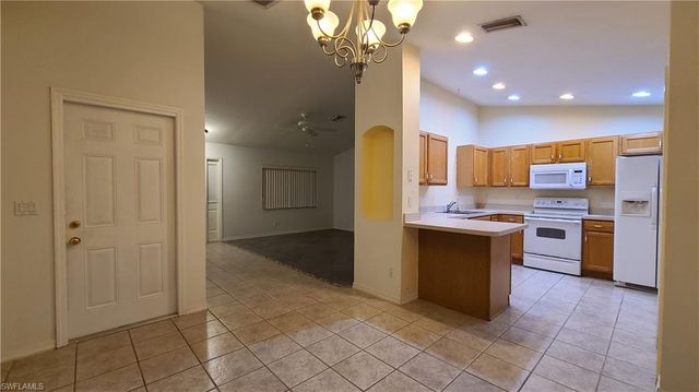 3106 10th ST W, Lehigh Acres, FL 33971