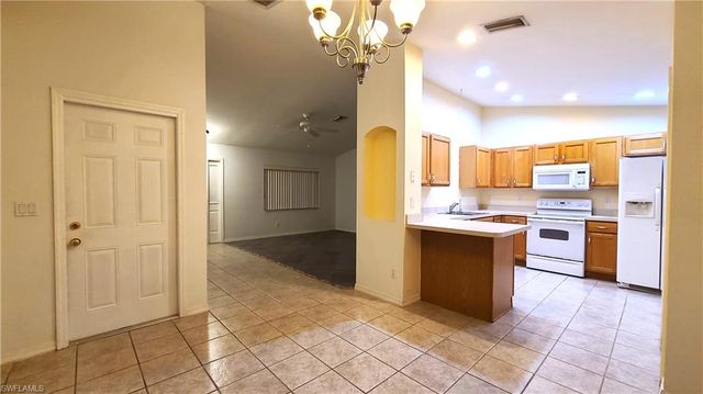 3106 10th ST W, Lehigh Acres, FL 33971