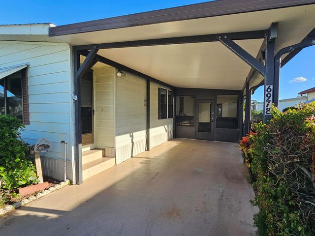 6978 SE Delegate Street, Hobe Sound, FL 33455