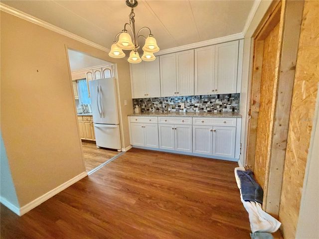 145 ROYAL PALM DRIVE, Leesburg, FL 34748