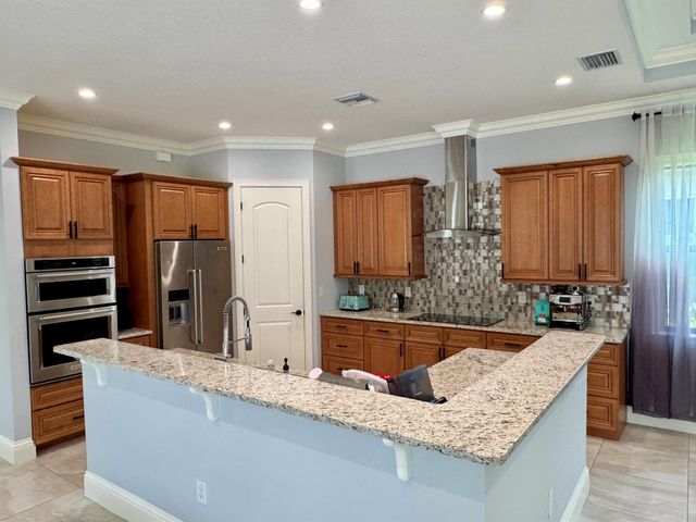 134 SE Fiore Bello, Port St Lucie, FL 34984
