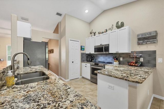 12028 NEWGATE AVENUE, Port Charlotte, FL 33981