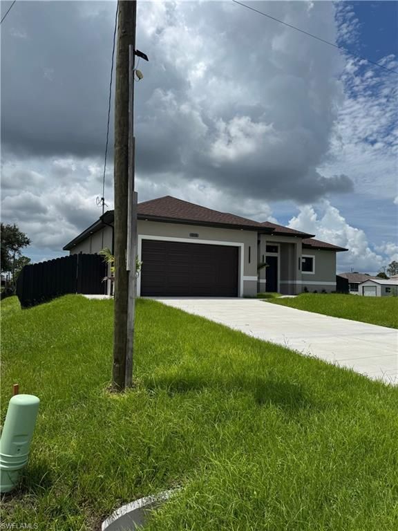 3115 2nd ST SW, LEHIGH ACRES, FL 33976 — photo 2