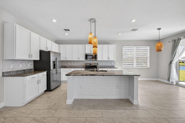 10916 SW Robbia Way, Port St. Lucie, FL 34987