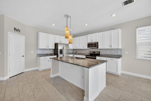 10916 SW Robbia Way, Port St. Lucie, FL 34987