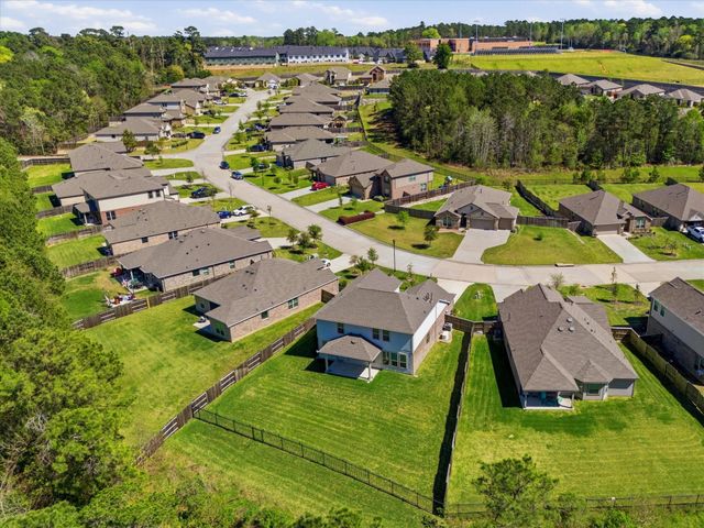 6048 Heritage Creek Lane, Conroe, TX 77304