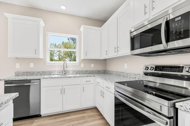 704 Blazing Star Drive, Raymore, MO 64083