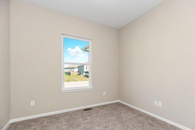 704 Blazing Star Drive, Raymore, MO 64083