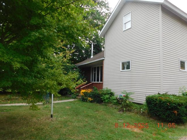 207 Garden Lane, Fowlerville Village, MI 48836