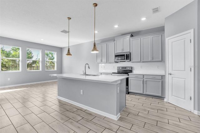 1048 DOWNSWING PLACE, Davenport, FL 33896