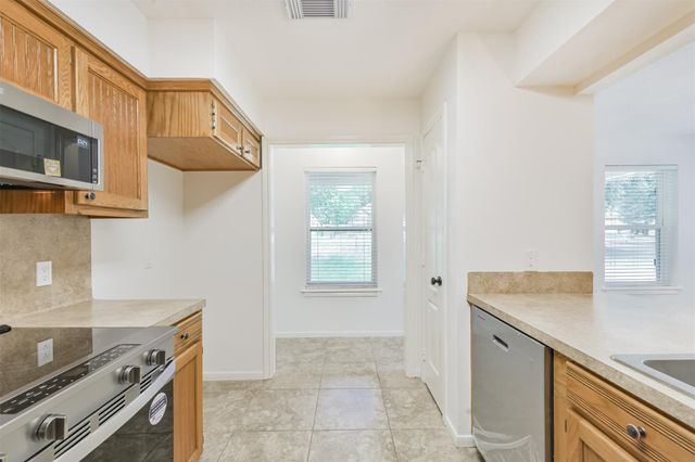 28814 Champion Oaks Drive, Magnolia, TX 77354