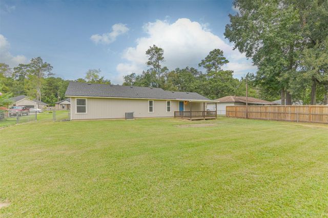 28814 Champion Oaks Drive, Magnolia, TX 77354