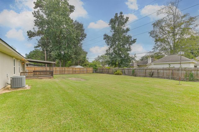 28814 Champion Oaks Drive, Magnolia, TX 77354