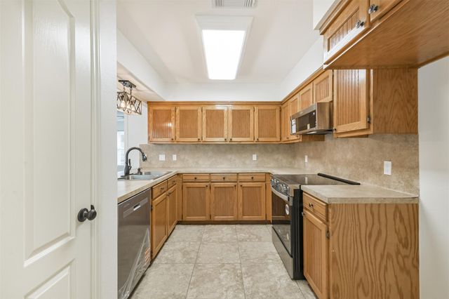28814 Champion Oaks Drive, Magnolia, TX 77354