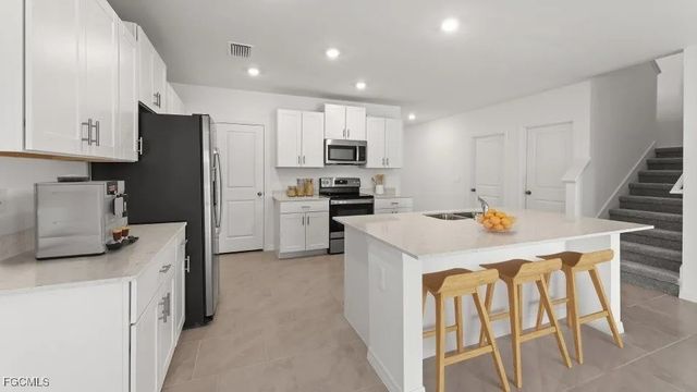 12222 Amber Waves RD, Lehigh Acres, FL 33974